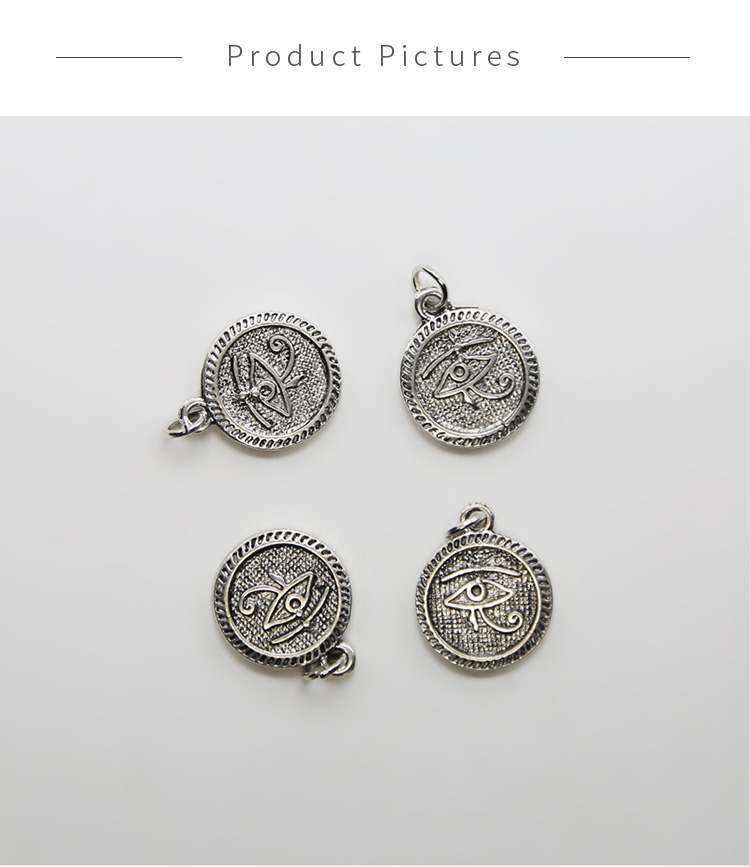 Coin with Eye Antique Silver Charm