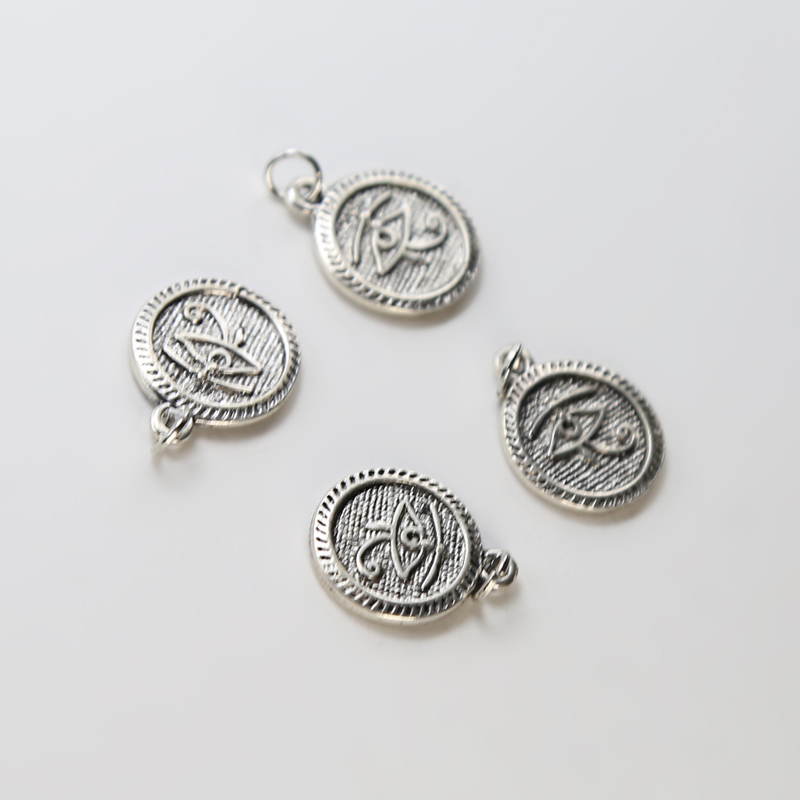 Coin with Eye Antique Silver Charm