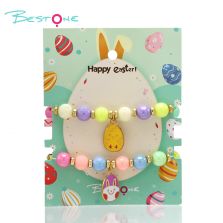 Colorful Woven Beaded Bracelet with Acrylic Beads, Plastic Gold Rings, and Oval Alloy Egg Pendant Colorful Woven Beaded Bracelet with Acrylic Beads, Plastic Gold Rings, and Oval Alloy Egg Pendant